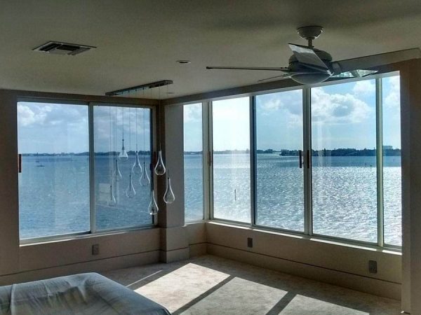 Bedroom with waterfront view.