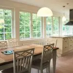 kitchen furniture next to multiple windows