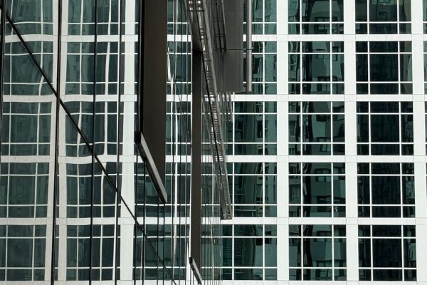 commercial-glass-building-facade-florida Modern Florida commercial building glass facade in full afternoon sun