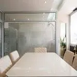 Conference room with glass walls with decorative window tint
