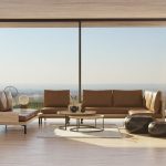 Sunlit Florida living room with floor to ceiling glass windows letting in bright afternoon heat and glare