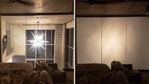 Living room glass partition shown clear then switched to opaque white with smart privacy film