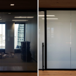 Office glass partition clear on the left and frosted privacy film on the right