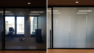 Office glass partition clear on the left and frosted privacy film on the right