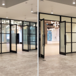 Black-framed glass office partition shown clear then frosted with switchable smart privacy film