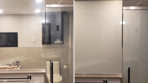 Bathroom shower glass shown transparent then turned opaque white with smart privacy film