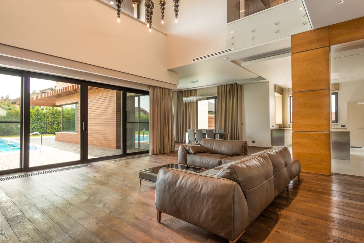 window film for sliding glass doors in a bright Florida living room overlooking a pool